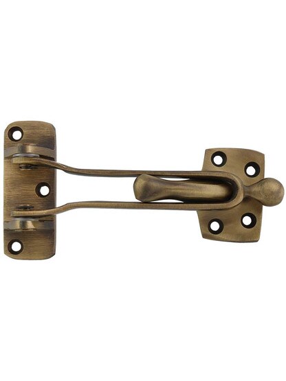 5 inch Swing-Arm Door Guard in Antique Brass.